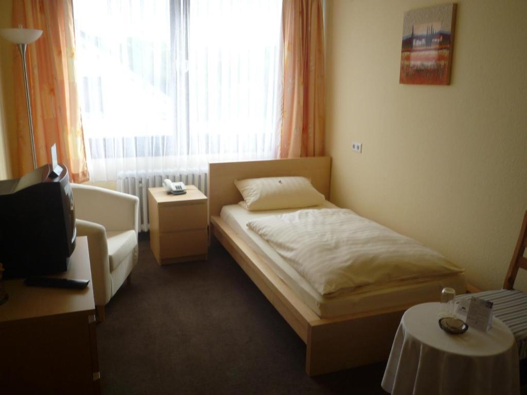 Center Hotel Gütersloh Rom bilde